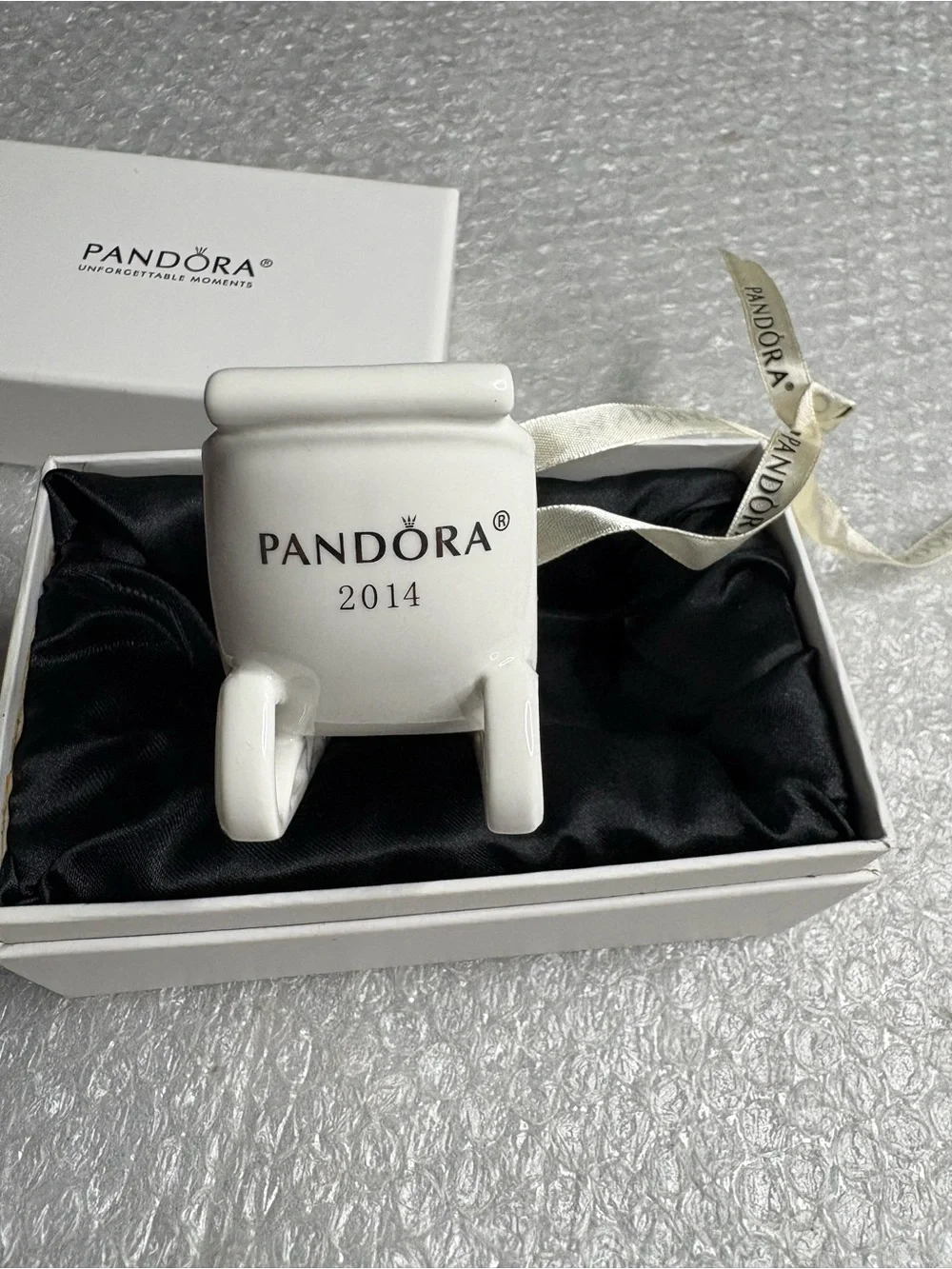 Pandora white porcelain sleigh ornament